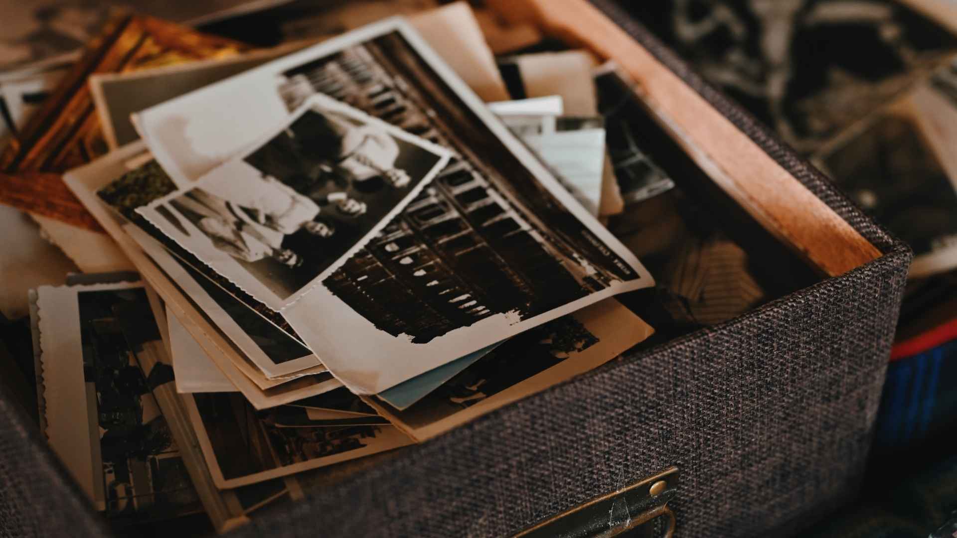 Vintage family photos in a memory box — Celebrate Life Iowa funeral planning and cremation services